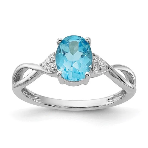 14k White Gold Oval Blue Topaz and Diamond Ring