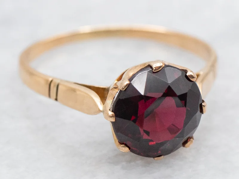 Garnet Solitaire Ring set in Vintage Gold Mounting