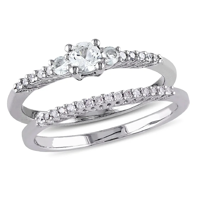 Miadora Sterling Silver Created White Sapphire and 1/10ct TDW Diamond 3-Stone Wedding Ring Set